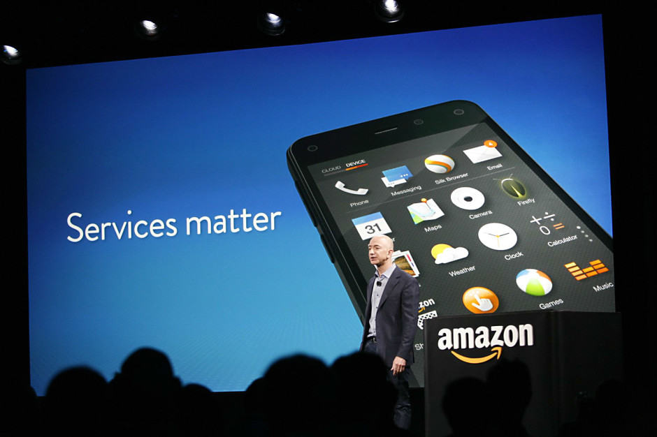 Amazon CEO Jeff Bezos touts Fire Phone's services at the Seattle launch event. But will Amazon's first phone really deliver? Photo: Roberto Baldwin/The Next Web